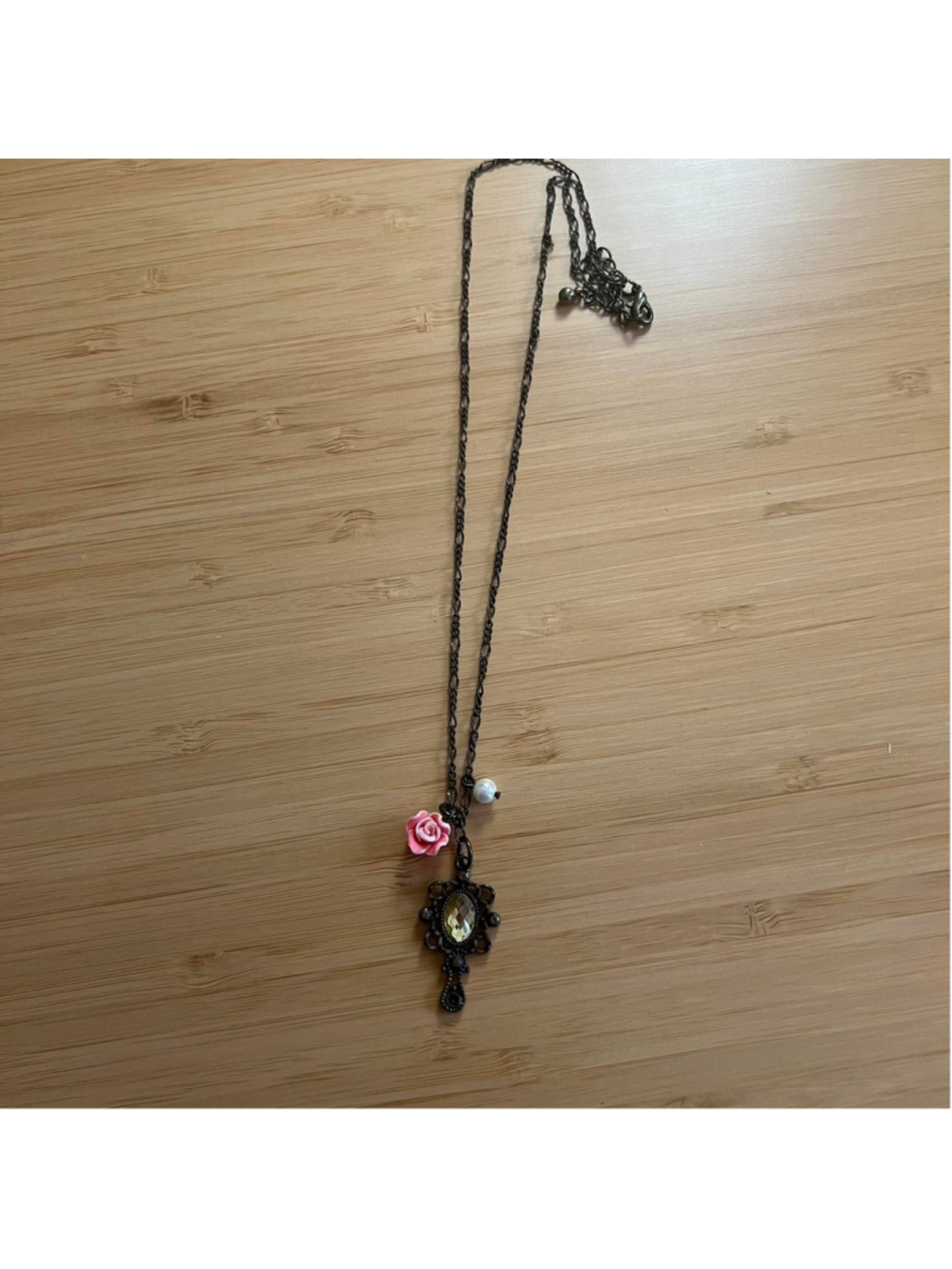 Vintage-looking bronze necklace with antique mirror charm